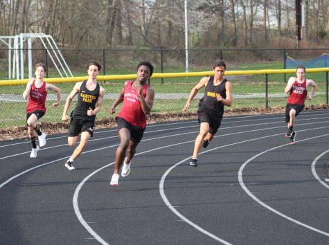 Anderson leads in an outdoor track meet on April 13th. 
