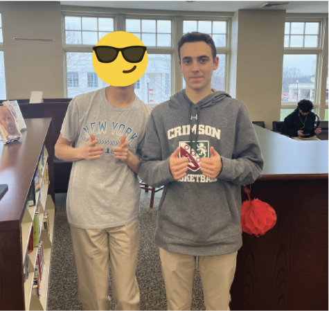 Justin Benbassat ‘23 sports an MBS basketball sweatshirt in compliance with the dress code. Unfortunately for his friend, t-shirts are not a part of the 2022-2023 dress code.